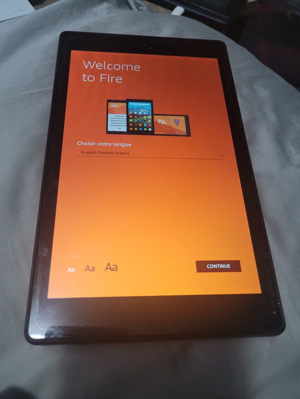 Amazon Fire 7 Tablet in Black with Orange Display Welcome Screen